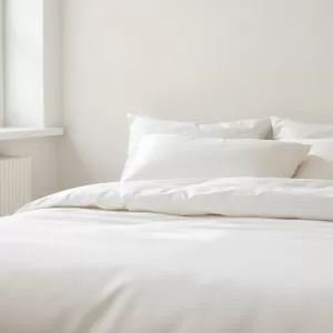 Jak ładnie pościelić łóżko w sypialni